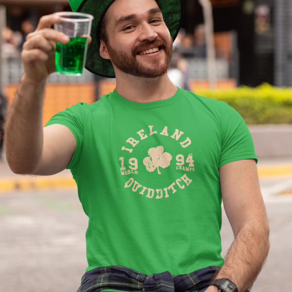 t shirt mockup of a man at a st patricks celebration drinking a green beer 32118 1